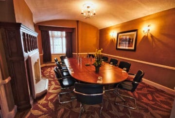 Boardroom meeting in the Hereford Suite